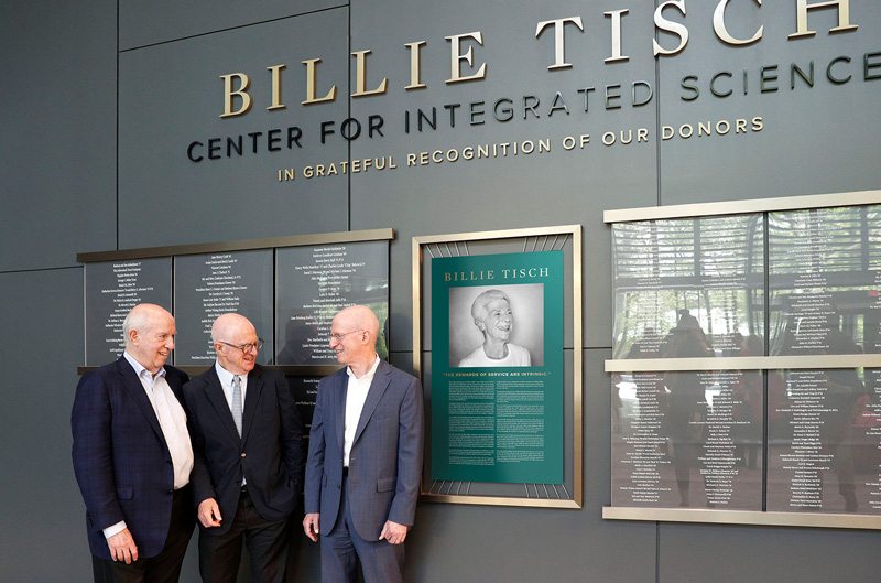 Members of the Tish family stand in the new Billie Tisch Center for Integrated Sciences at С